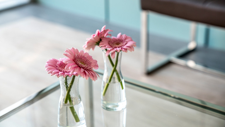 Vases with flowers at the etective treatment ward station in the Albertinen Hospital in Hamburg